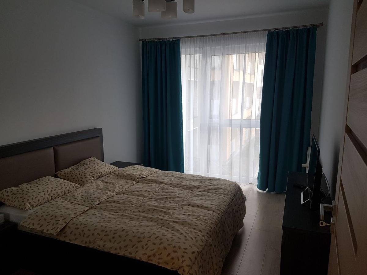Hotel Platinia Cluj-Napoca Exterior foto A bedroom in a typical apartment